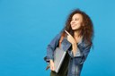 young-african-american-girl-teen-student-in-denim-clothes-backpack-hold-pc-isolated-on-blue-wall.jpg